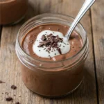 Creamy chocolate protein pudding with a rich texture and healthy ingredients