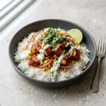 Colorful protein-packed chicken bowl with fresh vegetables and grains
