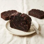 Easy one-bowl chocolate zucchini bread topped with mini chocolate chips