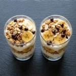Protein Banana Pudding Yogurt Parfait with fresh bananas and yogurt layers