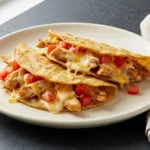 High-protein crispy chicken tacos served with fresh toppings